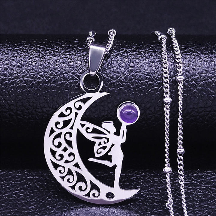Silver-tone crescent moon and fairy pendant necklace with purple accent