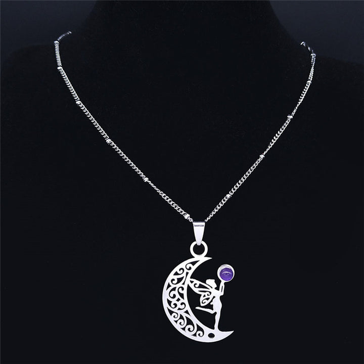 Silver-tone crescent moon and fairy pendant necklace shown with its chain