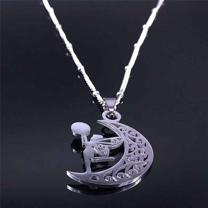 Rear view of the silver-tone crescent moon and fairy pendant necklace