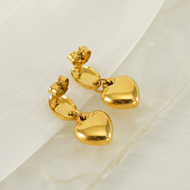 Heart drop earrings with hanging heart charms and oval post tops