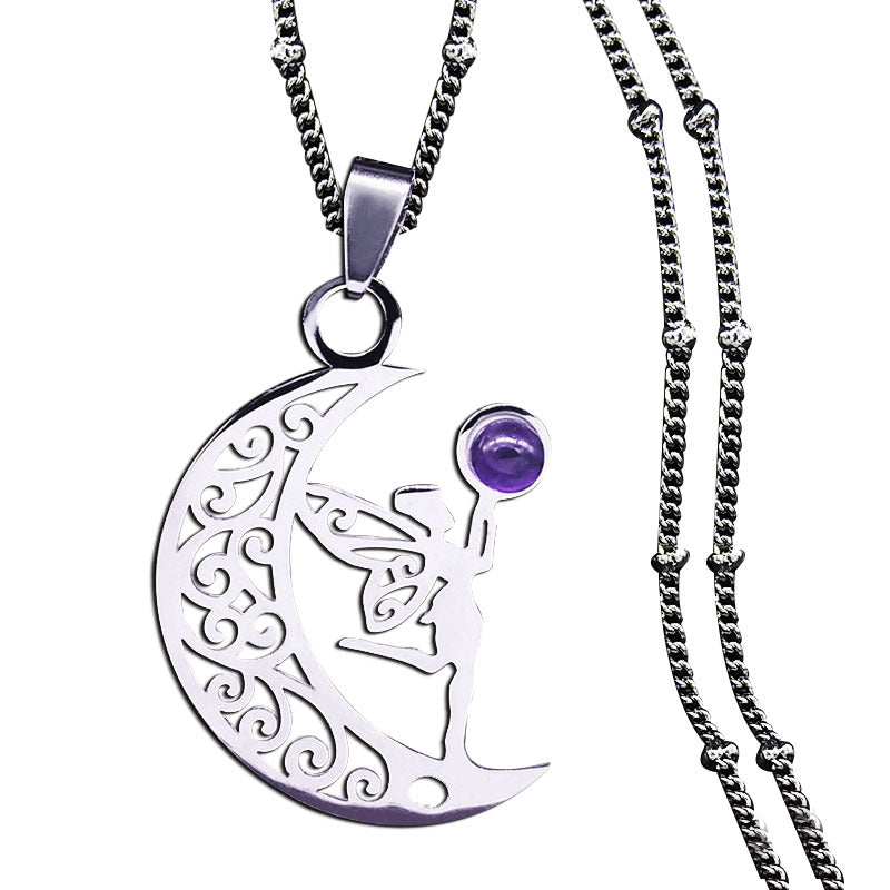 Silver-tone crescent moon and fairy pendant with purple accent on a white background