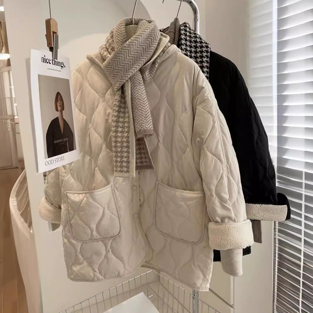 Beige quilted patch-pocket jacket. Supplier product photograph.